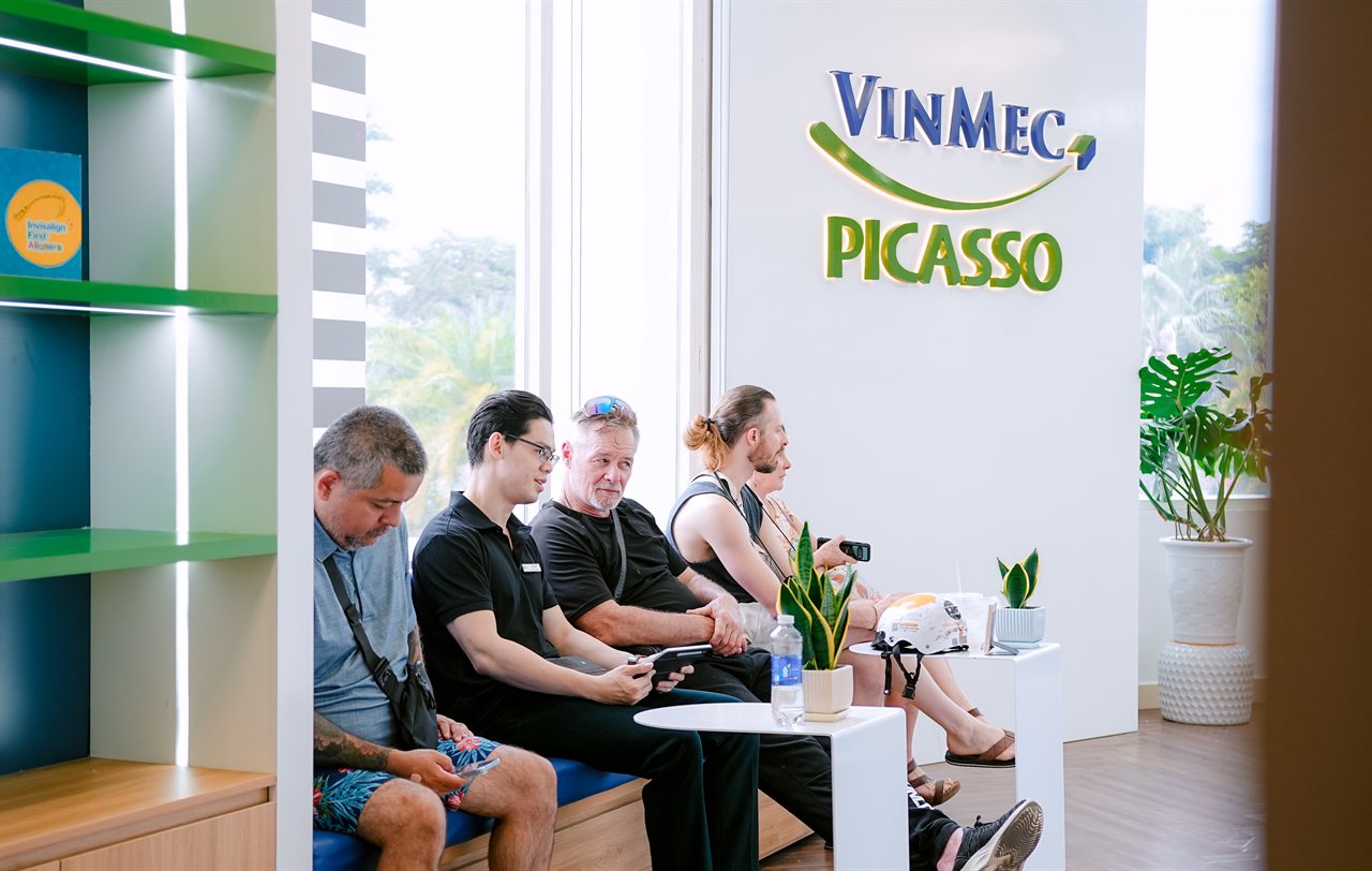 Patients seated in the Vinmec Picasso Dental waiting lounge
